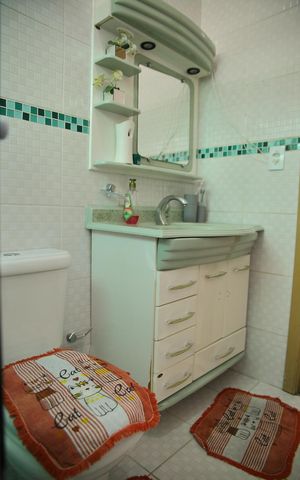 Casa à venda com 198m², 2 quartos e 4 vagasBanheiro casa 1 