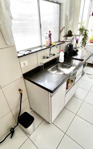 Apartamento à venda com 60m², 2 quartos e sem vaga Apartamento à venda com 60m², 2 quartos e sem vagaCozinha e Área de Serviço