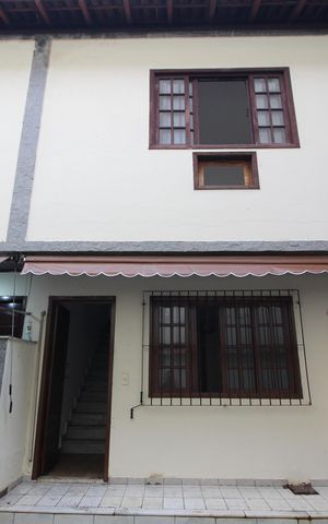 Casa de condomínio à venda com 81m², 2 quartos e 1 vagaFachada