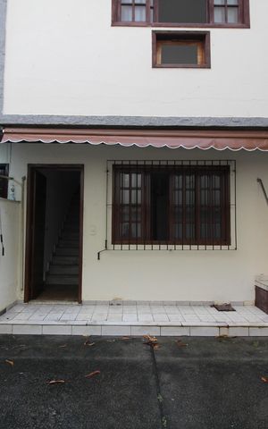 Casa de condomínio à venda com 81m², 2 quartos e 1 vagaFachada