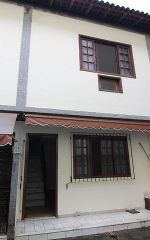 Casa de condomínio à venda com 81m², 2 quartos e 1 vagaFachada