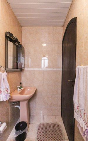 Casa à venda com 5m², 6 quartos e 2 vagas Casa à venda com 5m², 6 quartos e 2 vagasBanheiro Social Casa 3