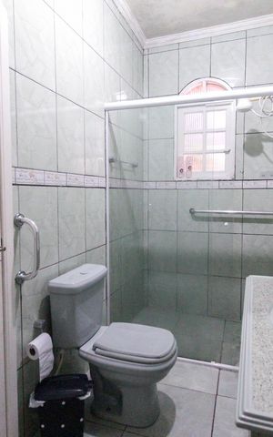 Casa à venda com 5m², 6 quartos e 2 vagas Casa à venda com 5m², 6 quartos e 2 vagasBanheiro da Suíte Casa 1
