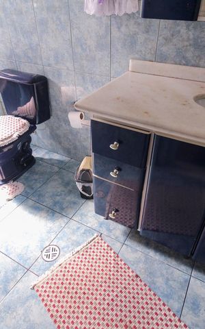Casa à venda com 5m², 6 quartos e 2 vagas Casa à venda com 5m², 6 quartos e 2 vagasBanheiro da Suíte Casa 3