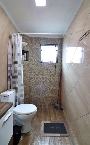 Casa à venda com 216m², 2 quartos e 4 vagasSuíte 1 Banheiro 