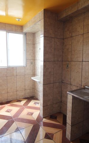 Apartamento à venda com 64m², 2 quartos e 1 vagaCozinha e Área de Serviço
