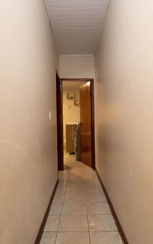 Casa à venda com 195m², 2 quartos e 2 vagas Casa à venda com 195m², 2 quartos e 2 vagasCorredor