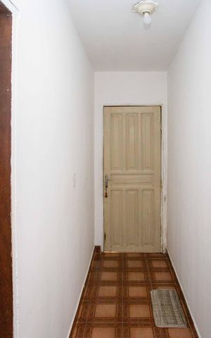Casa à venda com 80m², 3 quartos e 2 vagasCorredor