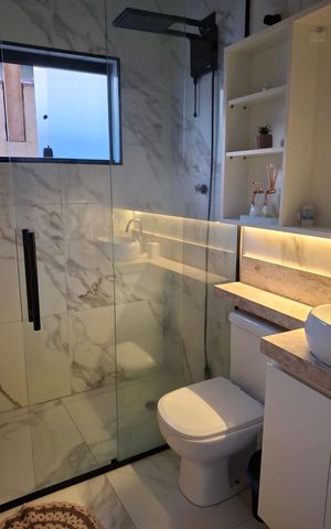 Casa à venda com 150m², 4 quartos e 2 vagas Casa à venda com 150m², 4 quartos e 2 vagasBanheiro