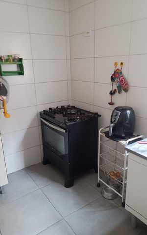Casa à venda com 142m², 3 quartos e 2 vagas Casa à venda com 142m², 3 quartos e 2 vagasCozinha