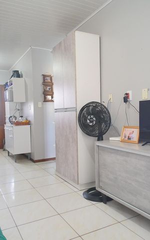 Casa à venda com 80m², 2 quartos e 2 vagasSala