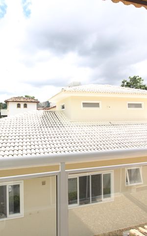 Casa de condomínio para alugar com 600m², 6 quartos e 4 vagasQuarto 4 - Varanda