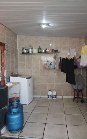 Casa à venda com 327m², 3 quartos e 3 vagasLavanderia