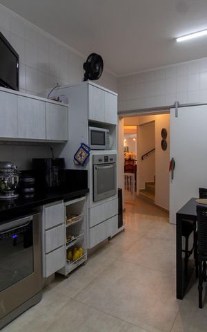 Casa de condomínio à venda com 421m², 4 quartos e 4 vagas Casa de condomínio à venda com 421m², 4 quartos e 4 vagasCOZINHA