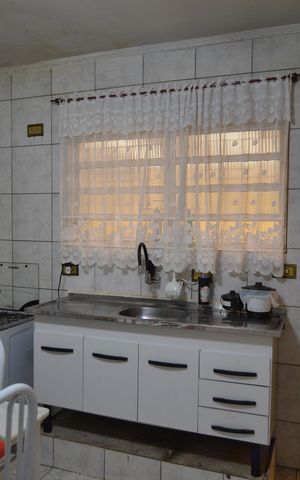 Casa à venda com 117m², 2 quartos e 2 vagasCozinha