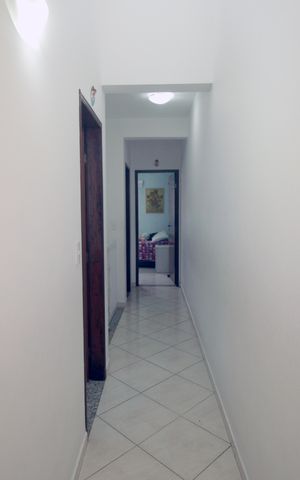 Casa à venda com 98m², 3 quartos e 2 vagasCorredor