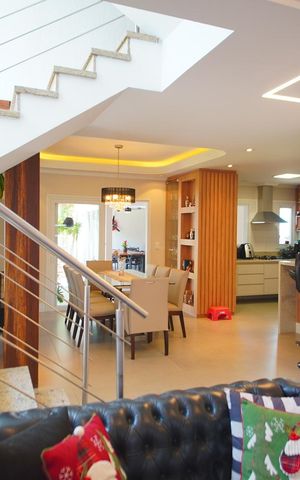 Casa de condomínio à venda com 360m², 3 quartos e 6 vagasSala de Estar 1