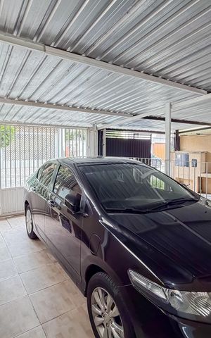Casa à venda com 180m², 6 quartos e 2 vagas Casa à venda com 180m², 6 quartos e 2 vagasGaragem