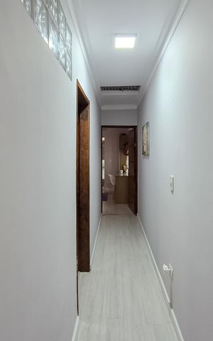 Casa à venda com 129m², 3 quartos e 2 vagas Casa à venda com 129m², 3 quartos e 2 vagascorredor