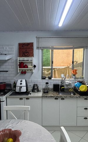 Casa à venda com 135m², 4 quartos e 1 vaga Casa à venda com 135m², 4 quartos e 1 vagaCozinha