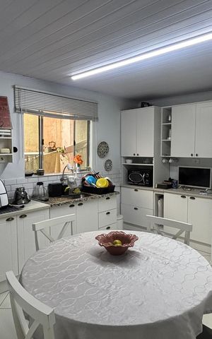Casa à venda com 135m², 4 quartos e 1 vaga Casa à venda com 135m², 4 quartos e 1 vagaCozinha