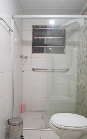 Casa à venda com 250m², 4 quartos e 3 vagasBanheiro