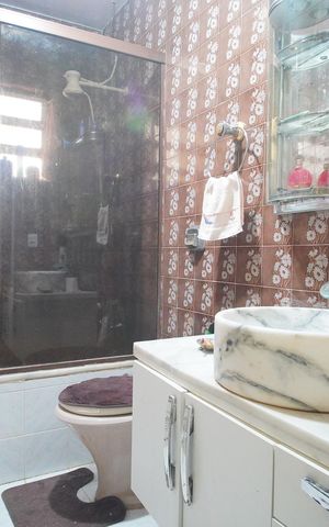 Casa à venda com 250m², 4 quartos e 3 vagasBanheiro da Suíte