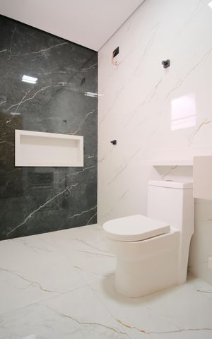 Casa à venda com 160m², 3 quartos e 3 vagasBanheiro da Suíte 1