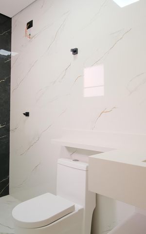 Casa à venda com 160m², 3 quartos e 3 vagasBanheiro da Suíte 1