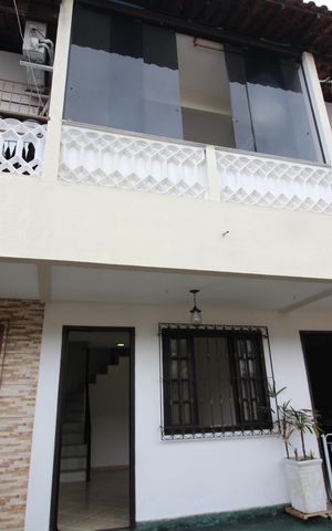 Casa de condomínio à venda com 57m², 2 quartos e 2 vagasFachada