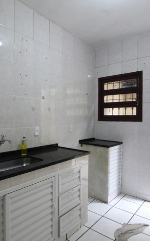 Casa de condomínio à venda com 57m², 2 quartos e 2 vagasCozinha