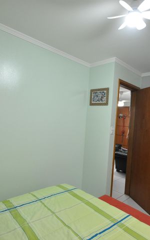 Casa de condomínio à venda com 52m², 2 quartos e 1 vagaQuarto 1