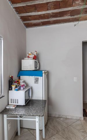 Casa à venda com 55m², 2 quartos e sem vaga Casa à venda com 55m², 2 quartos e sem vagaCozinha