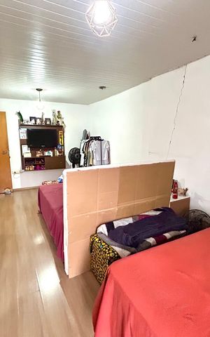 Casa à venda com 202m², 5 quartos e 2 vagas Casa à venda com 202m², 5 quartos e 2 vagasQuarto Suíte