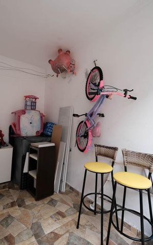 Casa de condomínio à venda com 71m², 2 quartos e 2 vagasGaragem