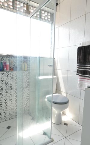 Casa à venda com 300m², 5 quartos e 4 vagasBanheiro da Suíte 3