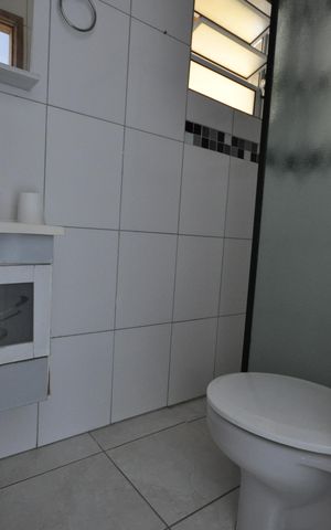 Casa à venda com 150m², 4 quartos e 2 vagasBanheiro do Quarto Suíte 2
