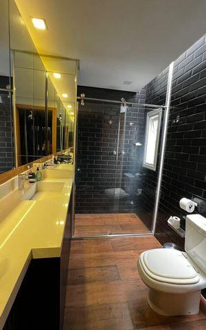 Casa de condomínio à venda com 329m², 4 quartos e 3 vagasBanheiro
