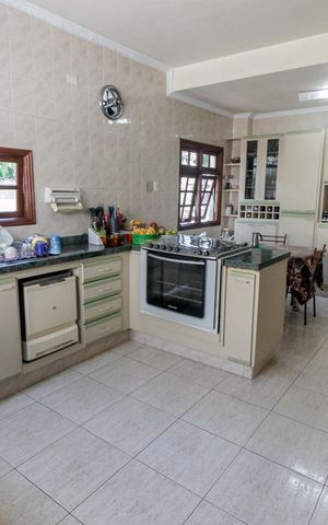 Casa de condomínio à venda com 509m², 5 quartos e 4 vagasCozinha - Armários