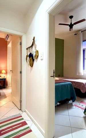 Apartamento à venda com 90m², 2 quartos e sem vagaCorredor de acesso aos quartos