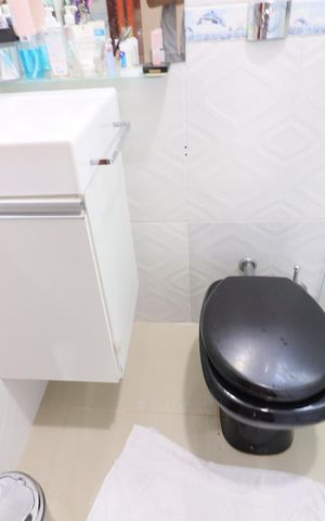 Casa à venda com 180m², 2 quartos e 5 vagasBanheiro da Suíte 1