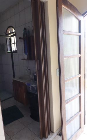 Casa à venda com 211m², 4 quartos e 2 vagasSuíte 1