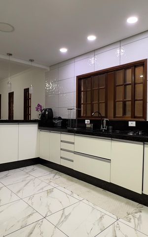 Casa à venda com 150m², 3 quartos e 2 vagas Casa à venda com 150m², 3 quartos e 2 vagasCozinha