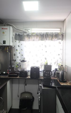 Apartamento à venda com 48m², 2 quartos e 1 vagaCozinha e Área de Serviço