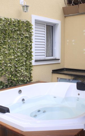 Casa à venda com 219m², 4 quartos e 4 vagasEspaço Gourmet com hidromassagem