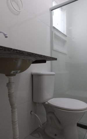 Casa de condomínio à venda com 70m², 2 quartos e 1 vagaBanheiro social