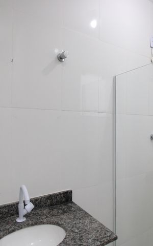 Casa de condomínio à venda com 70m², 2 quartos e 1 vagaBanheiro da suíte