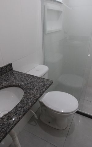Casa de condomínio à venda com 70m², 2 quartos e 1 vagaBanheiro social