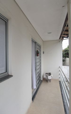Casa à venda com 525m², 6 quartos e 5 vagasCasa 1 | Varanda da Sala