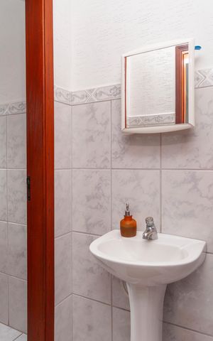 Casa à venda com 303m², 3 quartos e 3 vagasBanheiro